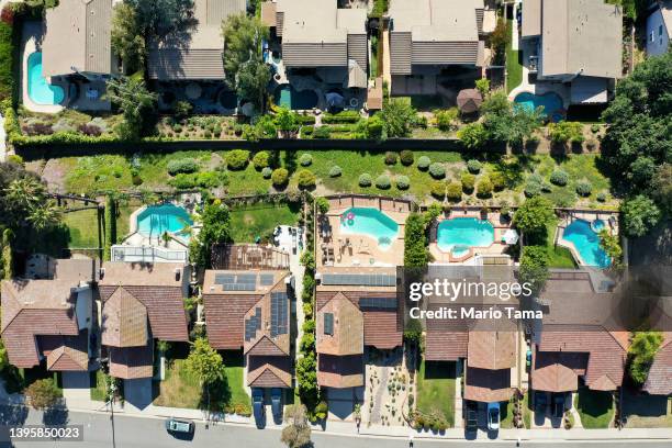 An aerial view of homes in one of the many cities in Southern California where residents will be limited to one day per week of outdoor watering on...