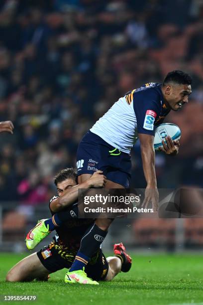 Irae Simone of the Brumbies charges forward during the round 12 Super Rugby Pacific match between the Chiefs and the ACT Brumbies at FMG Stadium...