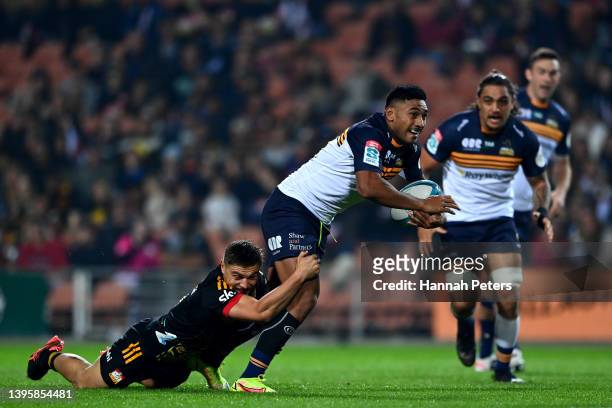 Irae Simone of the Brumbies charges forward during the round 12 Super Rugby Pacific match between the Chiefs and the ACT Brumbies at FMG Stadium...