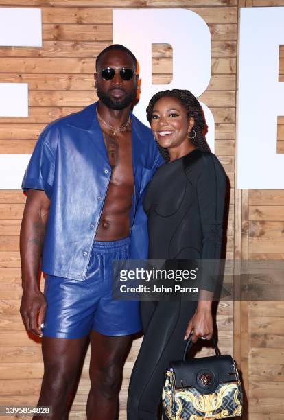 Dwyane Wade and Gabrielle Union attend American Express Presents CARBONE Beach at Carbone on May 06, 2022 in Miami Beach, Florida.
