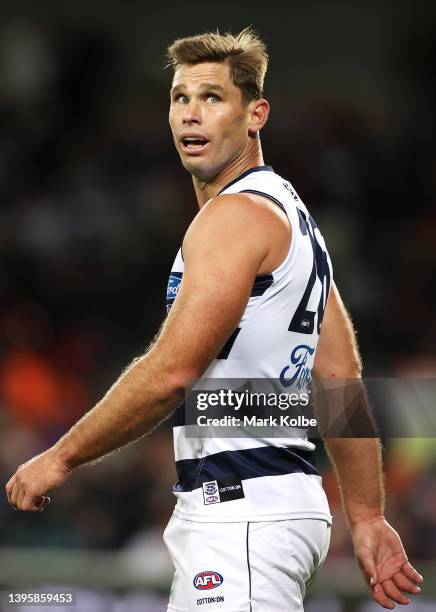 Tom Hawkins of the Geelong Cats shows his frustration as he looks at the replay on the big screen during the round eight AFL match between the...