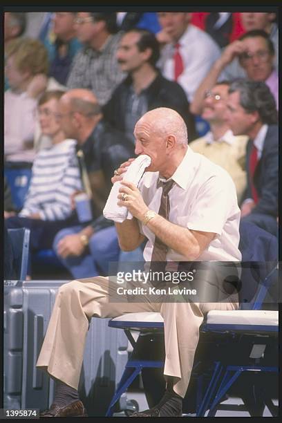 Head coach Jerry Tarkanian of the UNLV Rebels chews on a towel while watching a game. Mandatory Credit: Ken Levine /Allsport