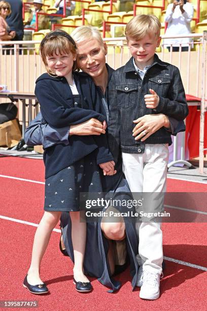 Princess Gabriella of Monaco, Princess Charlene of Monaco and Prince Jacques of Monaco attend the Sainte Devote Rugby Tournament on May 07, 2022 in...