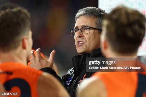 Giants head coach coach Leon Cameron talks to players during third quarter time during the round eight AFL match between the Greater Western Sydney...