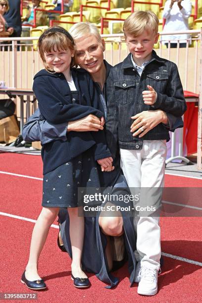 Princess Gabriella of Monaco, Princess Charlene of Monaco and Prince Jacques of Monaco attend the Sainte Devote Rugby Tournament on May 07, 2022 in...