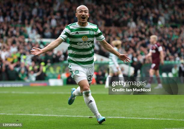 Daizen Maeda of Celtic celebrates after scoring their team's first goal during the Cinch Scottish Premiership match between Celtic and Heart of...