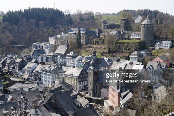 rooftops church tower and castle, monschau, germany - the medieval city of monschau foto e immagini stock