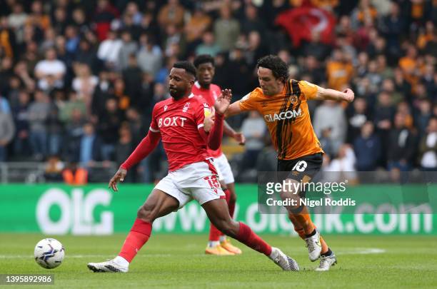 Cafu of Nottingham Forest passes the ball under pressure from George Honeyman of Hull City during the Sky Bet Championship match between Hull City...
