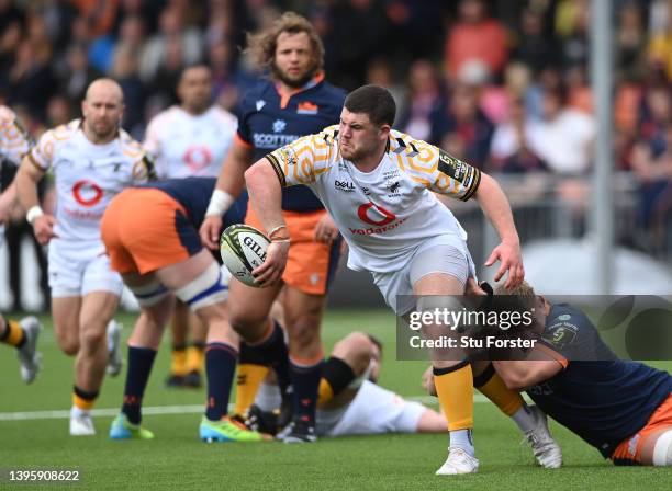 Wasps number 8 Alfie Barbeary offloads in the tackle during the EPCR Challenge Cup Quarter Finals match between Edinburgh Rugby and Wasps at DAM...