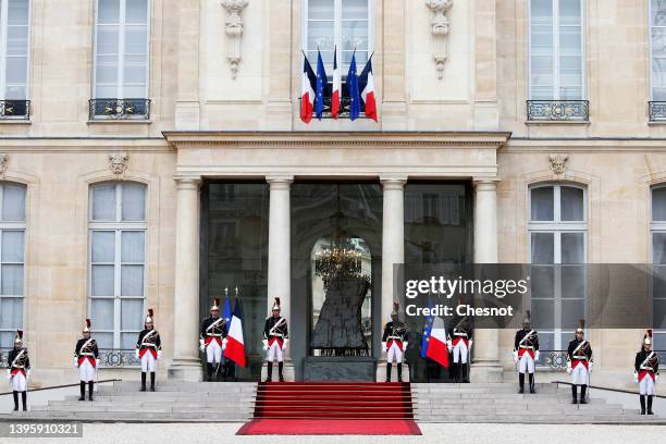 Republican guards take position on the front steps of the Elysee presidential palace prior to the investiture ceremony of French President Emmanuel...
