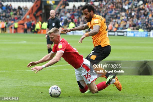 Tom Huddlestone of Hull City tackles Sam Surridge of Nottingham Forest leading to a penalty for Nottingham Forest during the Sky Bet Championship...