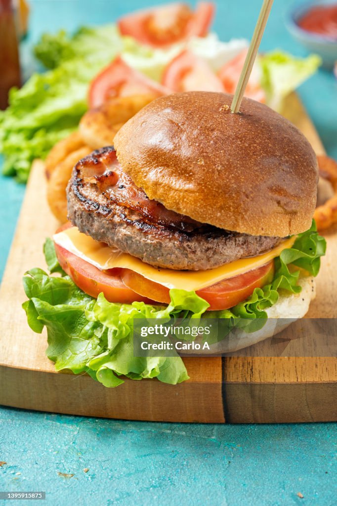 Homemade Burger with onion rings