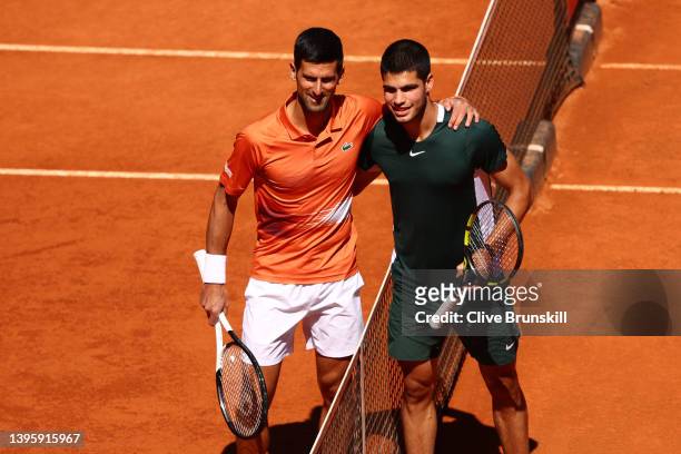 Novak Djokovic of Serbia and Carlos Alcaraz of Spain pose for a photo ahead of their Men's Singles Semi-finals match during day ten of Mutua Madrid...