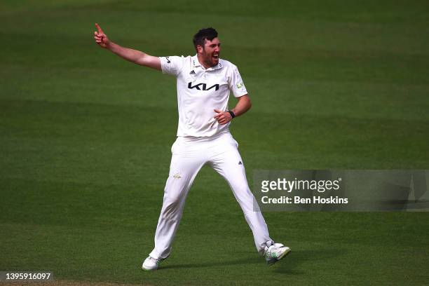 Jamie Overton of Surrey celebrates after taking the wicket of Saif Zaib of Northamptonshire during the LV= Insurance County Championship match...