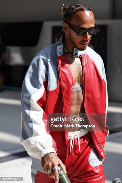 Lewis Hamilton of Great Britain and Mercedes walks in the Paddock prior to final practice ahead of the F1 Grand Prix of Miami at the Miami...