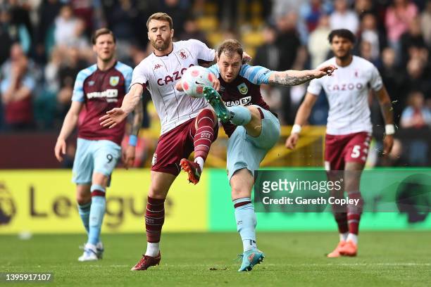 Ashley Barnes of Burnley battles for possession with Calum Chambers of Aston Villa during the Premier League match between Burnley and Aston Villa at...