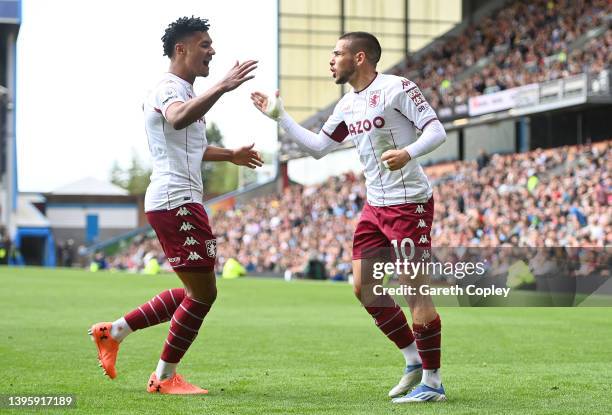 Emiliano Buendia of Aston Villa celebrates with teammate Ollie Watkins after scoring their team's second goal during the Premier League match between...