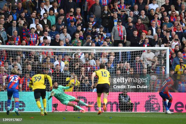 Wilfried Zaha of Crystal Palace celebrates after scoring their team's first goal from the penalty spot past Ben Foster of Watford FC during the...