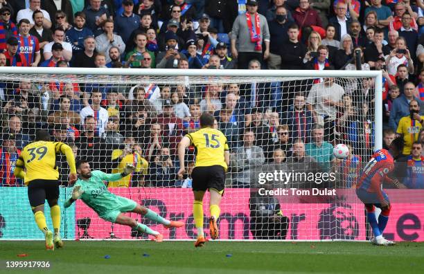 Wilfried Zaha of Crystal Palace celebrates after scoring their team's first goal from the penalty spot past Ben Foster of Watford FC during the...