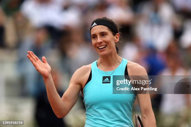 Andrea Petkovic of Germany shakes hands with Angelica Raggi of Italy after their ladies singles qualifying match against Andrea Petkovic of Germany...