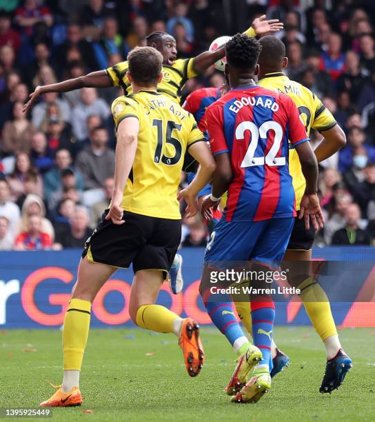 Hassane Kamara of Watford FC handles the ball which leads to a second yellow card during the Premier League match between Crystal Palace and Watford...