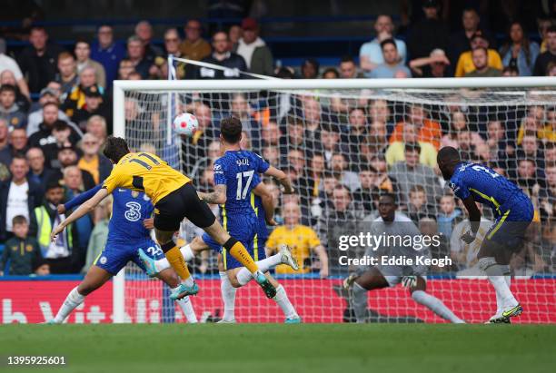 Francisco Trincao of Wolverhampton Wanderers scores their team's first goal during the Premier League match between Chelsea and Wolverhampton...