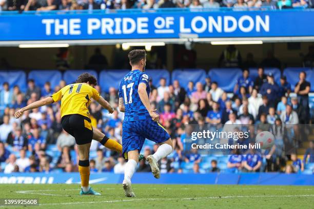 Francisco Trincao of Wolverhampton Wanderers scores their team's first goal during the Premier League match between Chelsea and Wolverhampton...