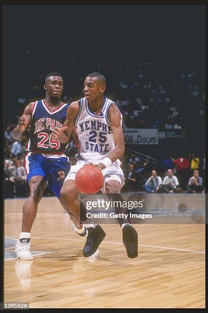 Guard Anfernee Hardaway of the Memphis State Tigers dribbles the ball down the court during a game against the DePaul Blue Demons at the Pyramid in...