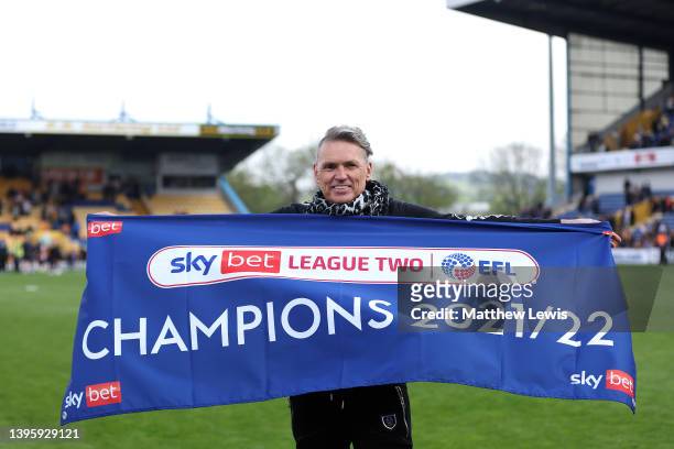 Dale Vince, Owner of Forest Green Rovers celebrates after their sides victory and promotion as League 2 champions during the Sky Bet League Two match...