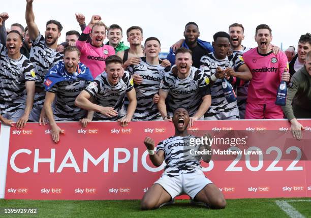 Forest Green Rovers players celebrate after their sides victory and promotion as League 2 champions during the Sky Bet League Two match between...