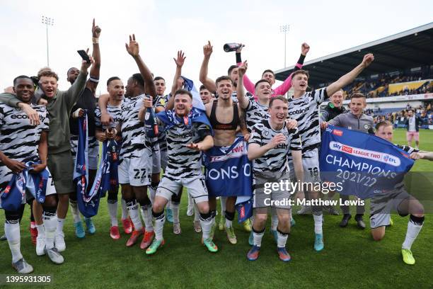 Forest Green Rovers players celebrate after their sides victory and promotion as League 2 champions during the Sky Bet League Two match between...