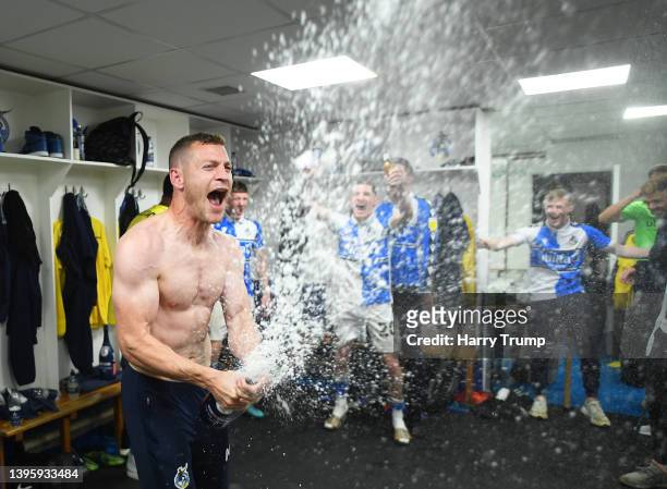 Paul Coutts of Bristol Rovers celebrates following promotion to League One following the Sky Bet League Two match between Bristol Rovers and...