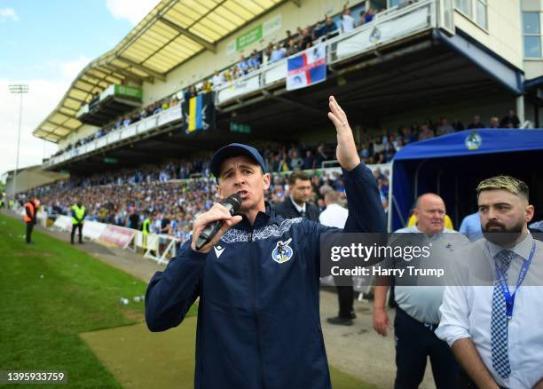 Joey Barton, Manager of Bristol Rovers interacts with the crowd as Police make their way onto the pitch following Elliot Anderson of Bristol Rovers...