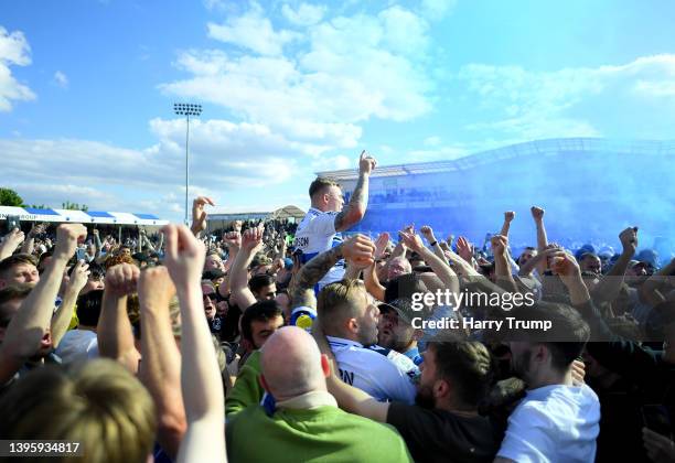 Elliot Anderson of Bristol Rovers celebrates following promotion to League One following the Sky Bet League Two match between Bristol Rovers and...