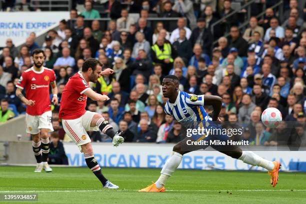 Juan Mata of Manchester United shoots during the Premier League match between Brighton & Hove Albion and Manchester United at American Express...