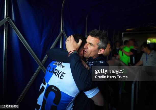 Joey Barton, Manager of Bristol Rovers and Trevor Clarke of Bristol Rovers celebrates following promotion to League One following the Sky Bet League...
