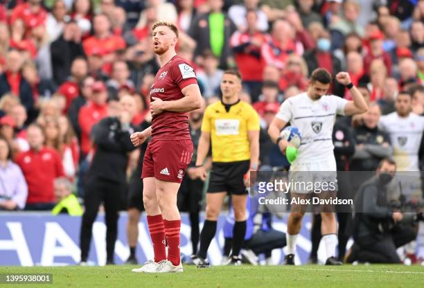 Ben Healy of Munster reacts as he misses his sides second attempt at the posts during the shoot out in the Heineken Champions Cup Quarter Final match...