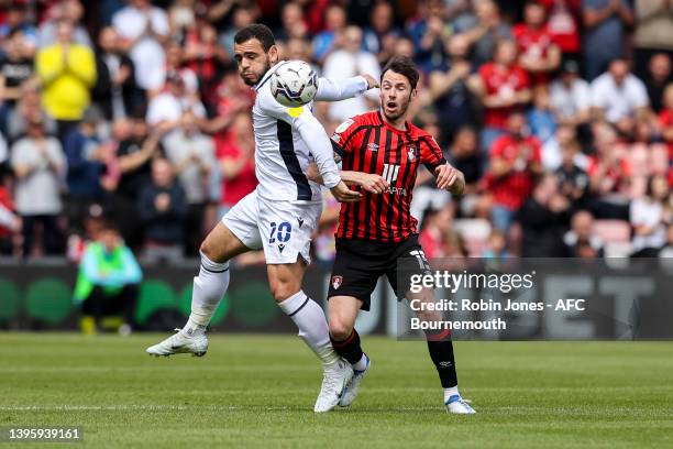 Mason Bennett of Millwall clears from Adam Smith of Bournemouth during the Sky Bet Championship match between AFC Bournemouth and Millwall at...
