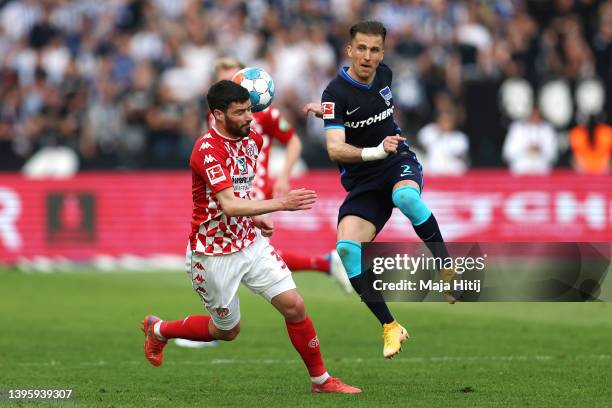 Aaron Martin of 1.FSV Mainz 05 is challenged by Peter Pekarik of Hertha Berlin during the Bundesliga match between Hertha BSC and 1. FSV Mainz 05 at...