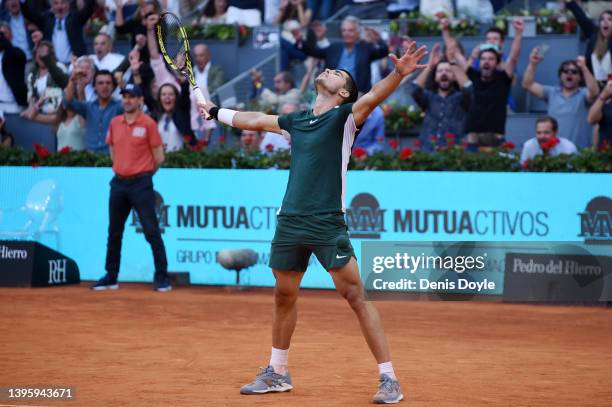 Carlos Alcaraz of Spain celebrates after winning match point in their Men's Singles semi-finals match against Novak Djokovic of Serbia during day ten...