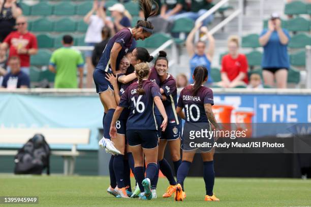 Nicoli Kerolin of the North Carolina Courage is mobbed by teammates after scoring a goal during a game between Washington Spirit and North Carolina...