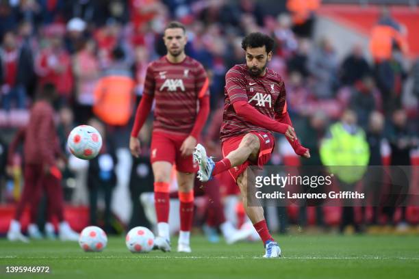 Mohamed Salah of Liverpool warms up prior to the Premier League match between Liverpool and Tottenham Hotspur at Anfield on May 07, 2022 in...
