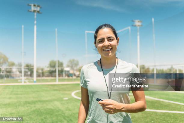 female soccer referee portrait - soccer referee stock pictures, royalty-free photos & images