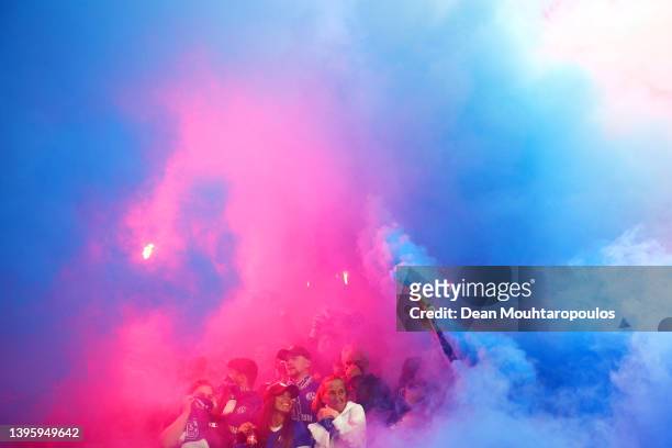 Fans set off flares prior to the Second Bundesliga match between FC Schalke 04 and FC St. Pauli at Veltins Arena on May 07, 2022 in Gelsenkirchen,...