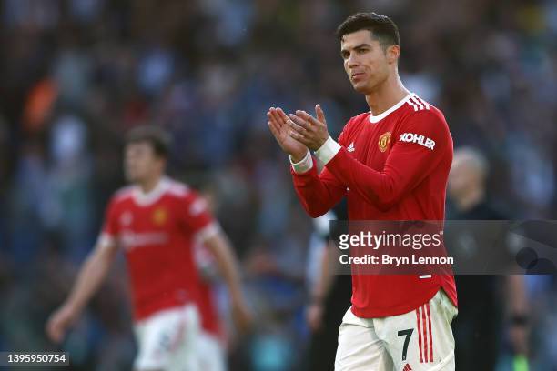 Cristiano Ronaldo of Manchester United applauds the fans after their sides defeat during the Premier League match between Brighton & Hove Albion and...