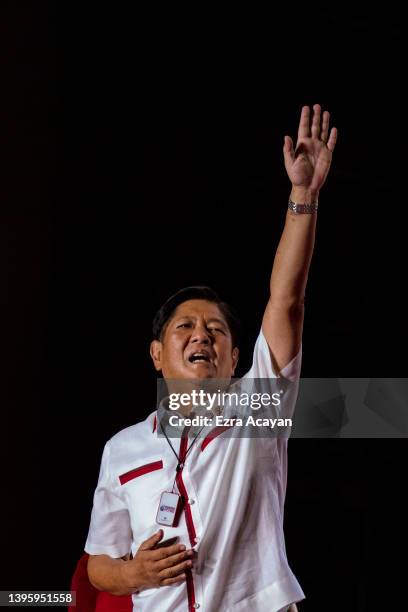 Ferdinand "Bongbong" Marcos Jr. Waves to supporters during his last campaign rally before the election on May 07, 2022 in Paranaque, Metro Manila,...