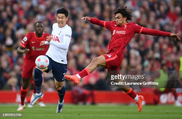 Trent Alexander-Arnold of Liverpool battles for possession with Heung-Min Son of Tottenham Hotspur during the Premier League match between Liverpool...