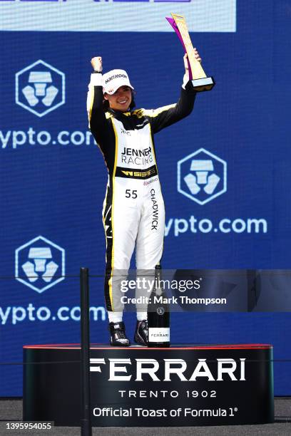 Race winner Jamie Chadwick of Great Britain and Jenner Racing celebrates on the podium during race 1 of W Series Round 1 at Miami International...