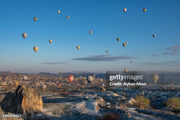 hot air ballooning in cappadocia, nevsehir, central anatolia of turkey - cappadocia stock pictures, royalty-free photos & images