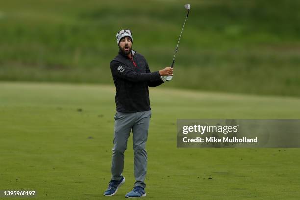 Tom Whitney of the United States celebrates after holing out his approach shot on the eighth hole for an eagle during the third round of the Simmons...